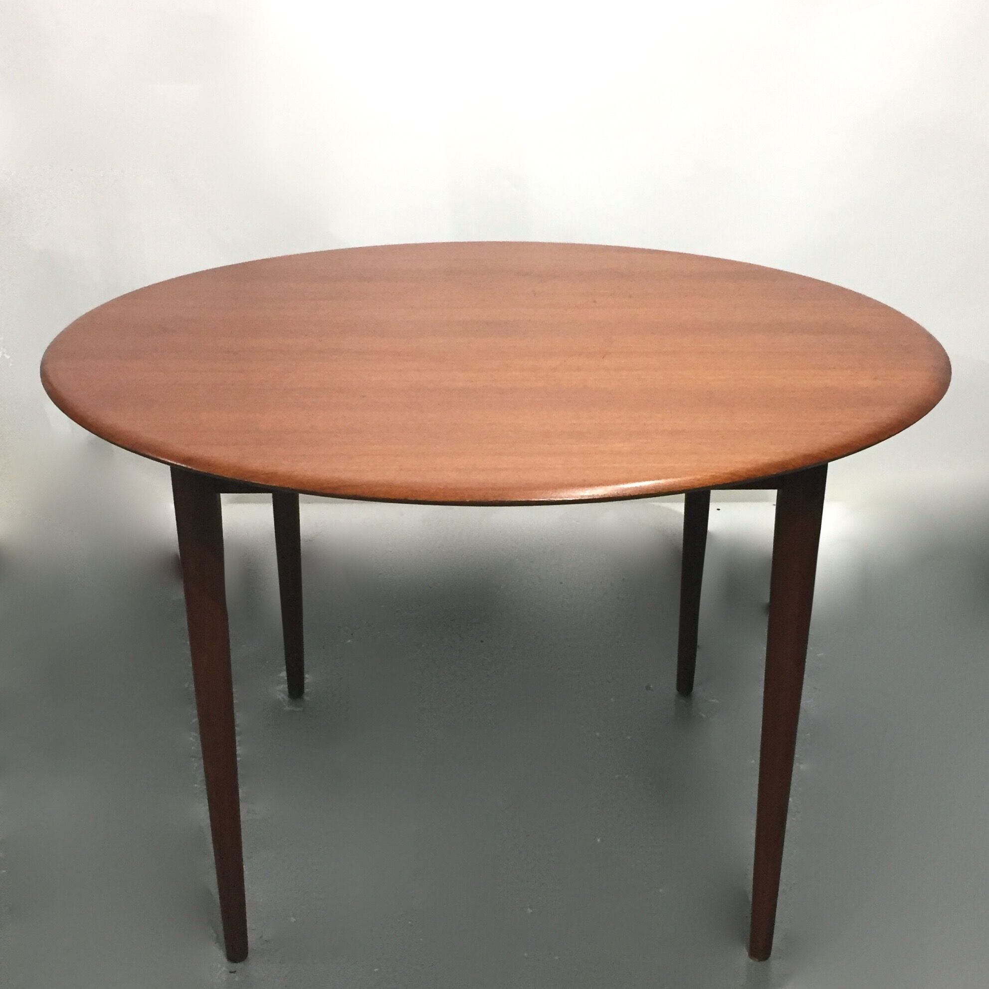 Round scandinavian teak table