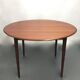 Round scandinavian teak table