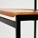 Teak chair on metal base