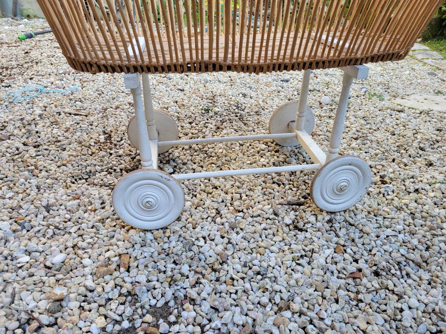 Wicker cradle on wheels, late 19th century