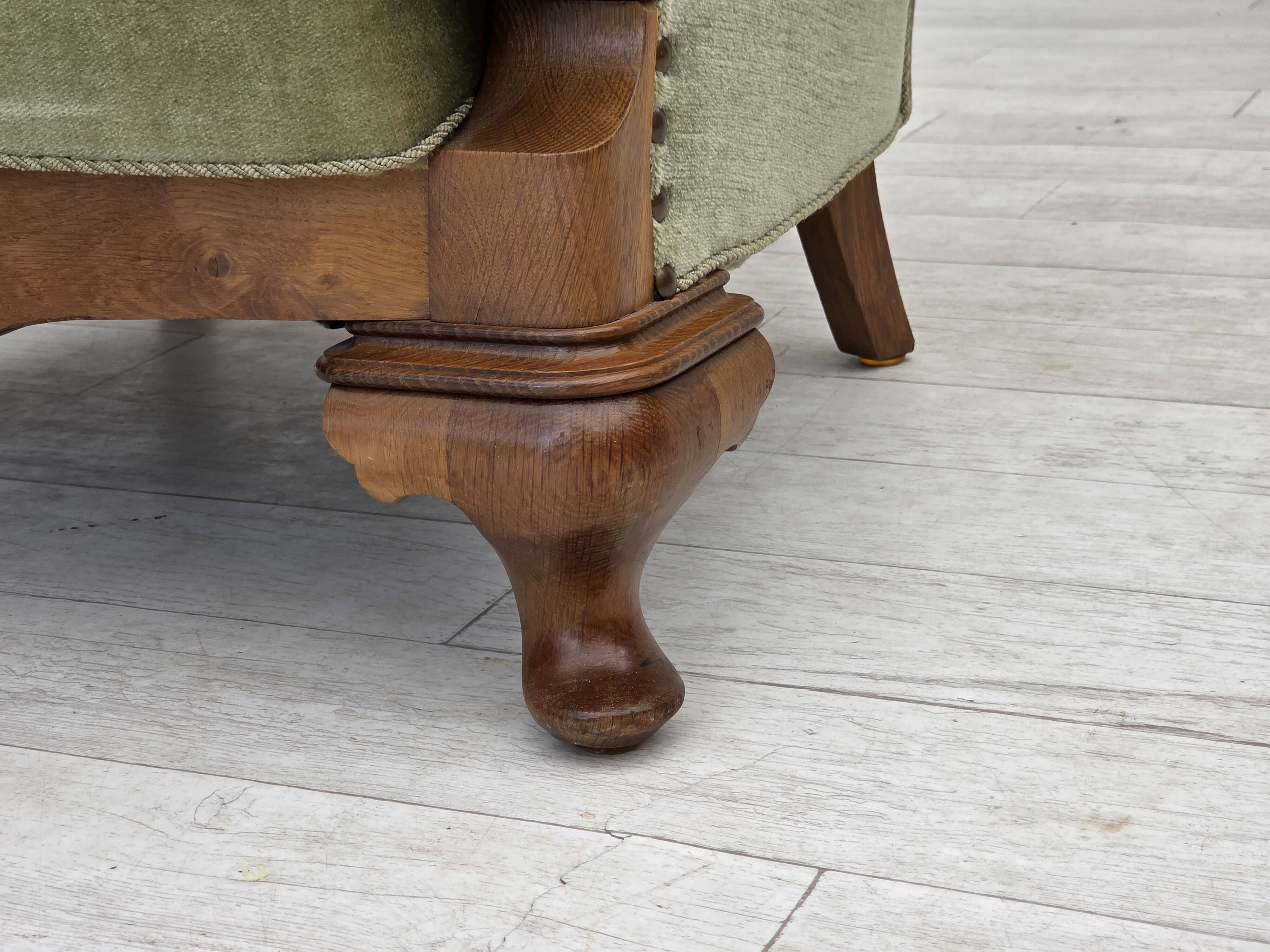1960s, Danish armchair, green furniture velour, carved oak wood.