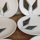 Six ceramic plates with matt enamel 50s