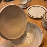 Complete old service in green and gold Limoges porcelain.