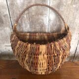 Old grape picker's basket wicker woven vines vintage wine