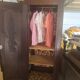 Vintage Louis Philippe style bonnetière wardrobe from the 1800s in cherry wood.