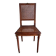 Art Deco caned chair with bronze ornaments.