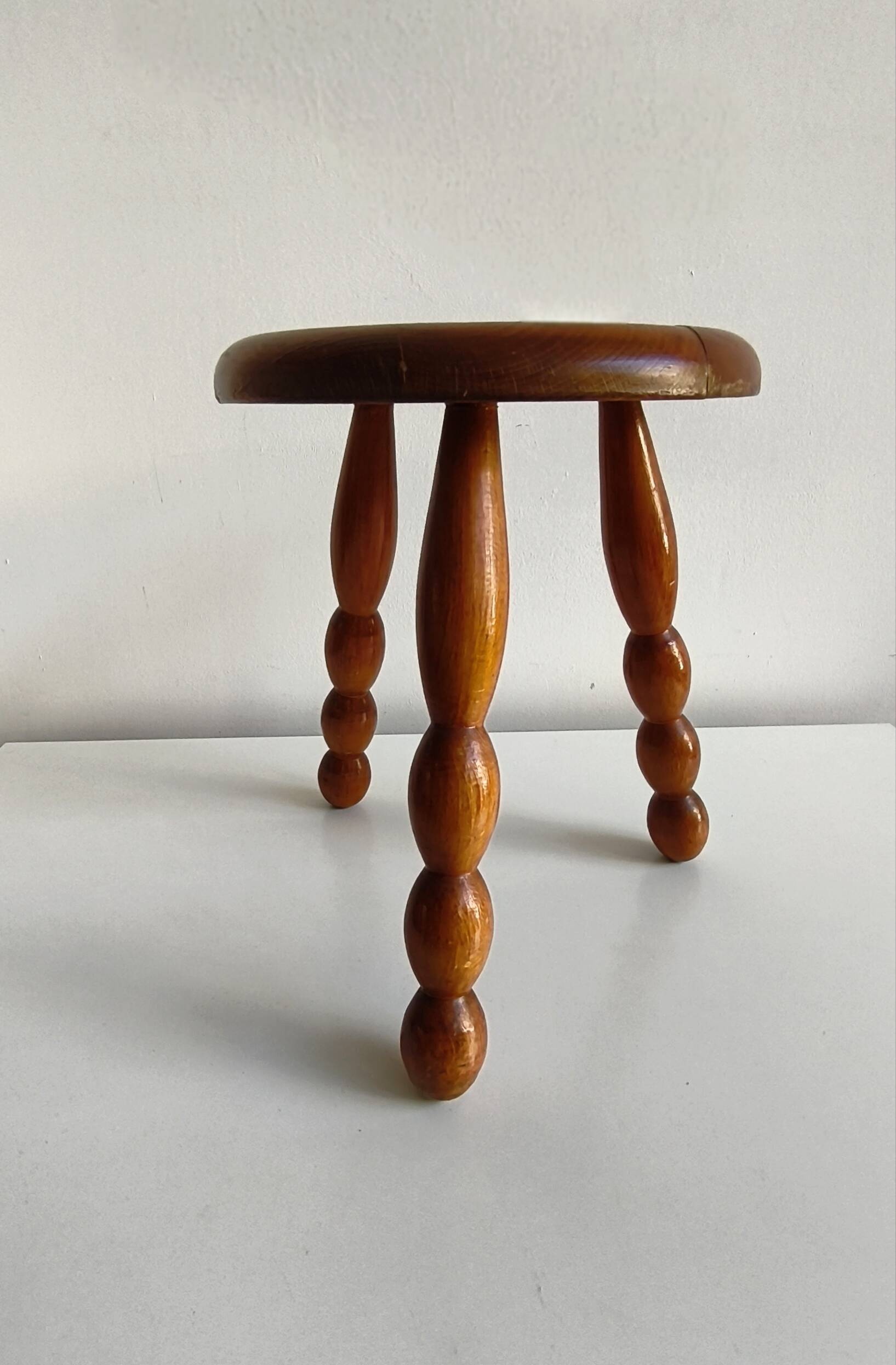 Turned wood tripod stool