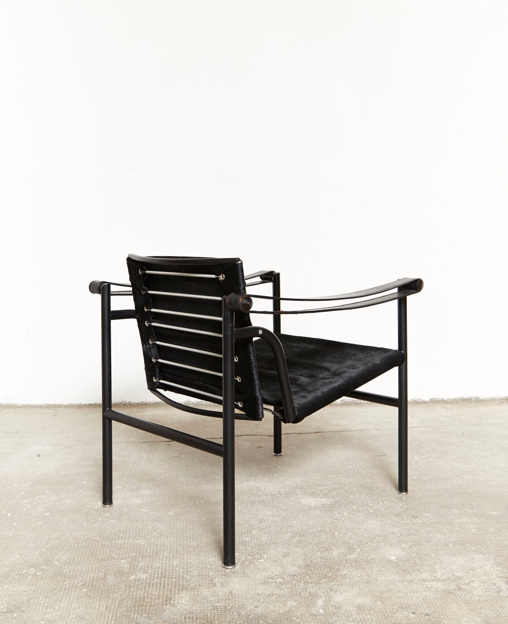 LC1 armchair by Le Corbusier, Perriand, & Jeanneret for Cassina