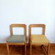 Six Scandinavian style chairs in elm and fabric.