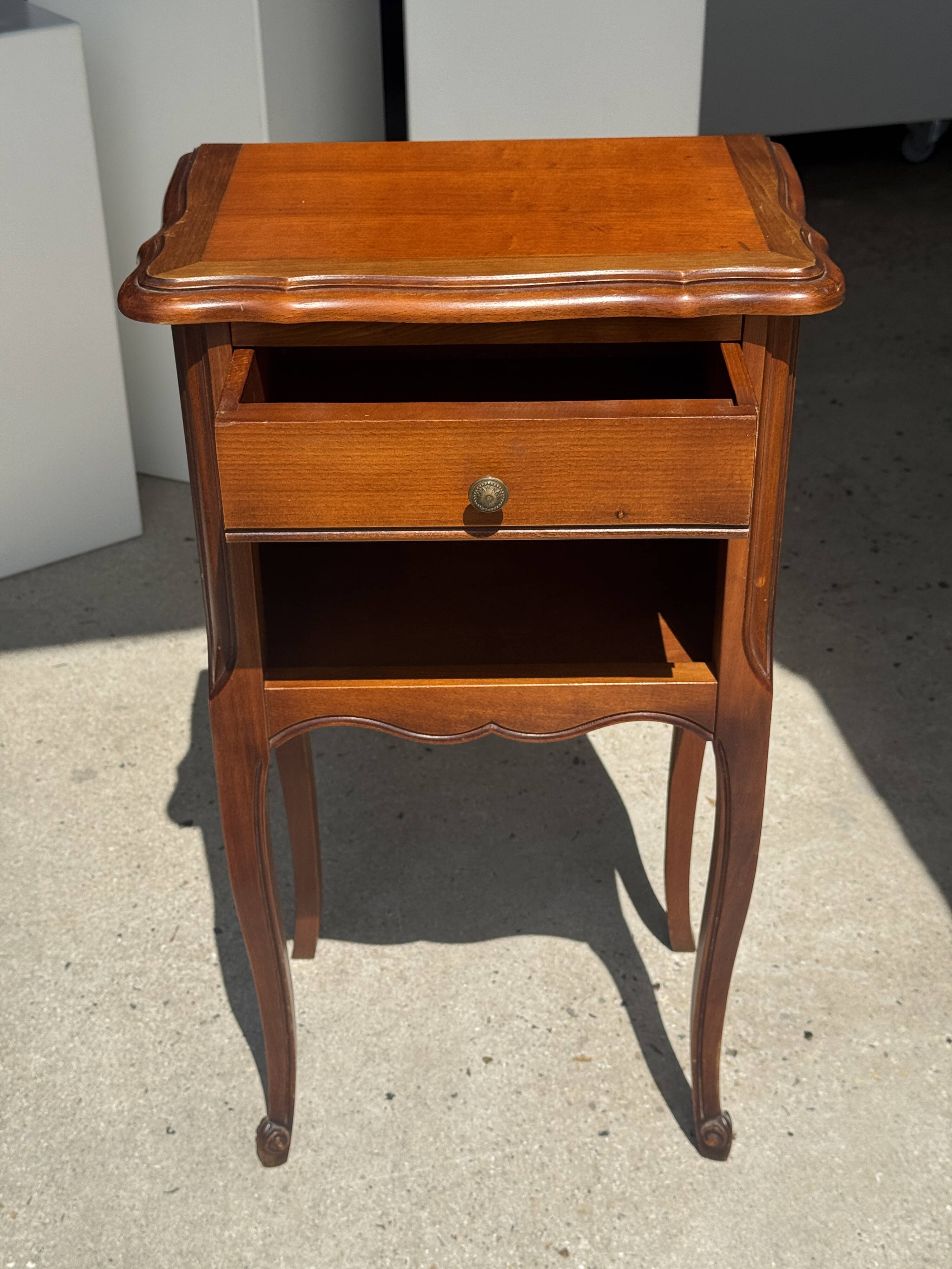 Classic wooden bedside table with drawer