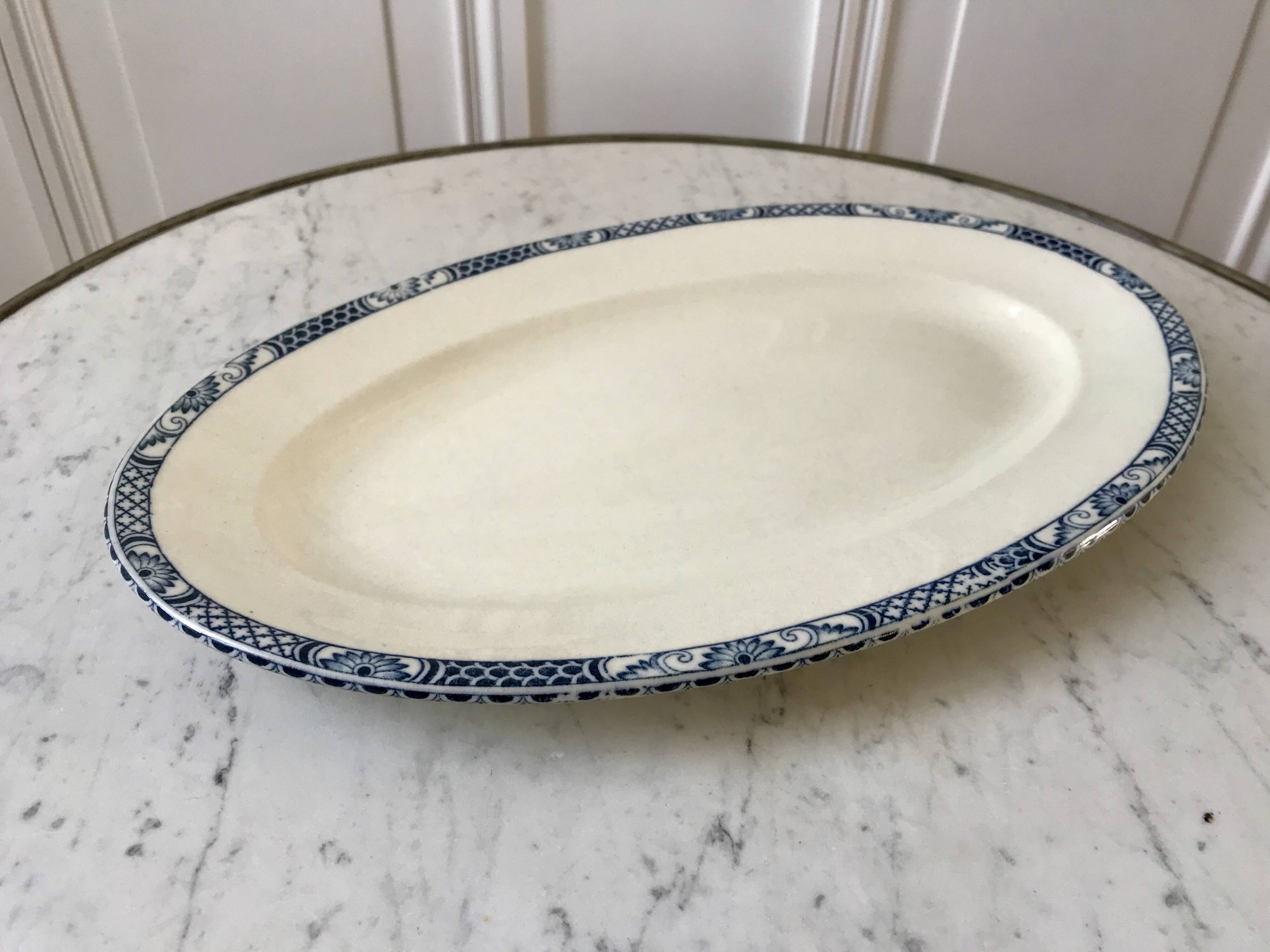 Oval dish in terre de fer bleu xixth