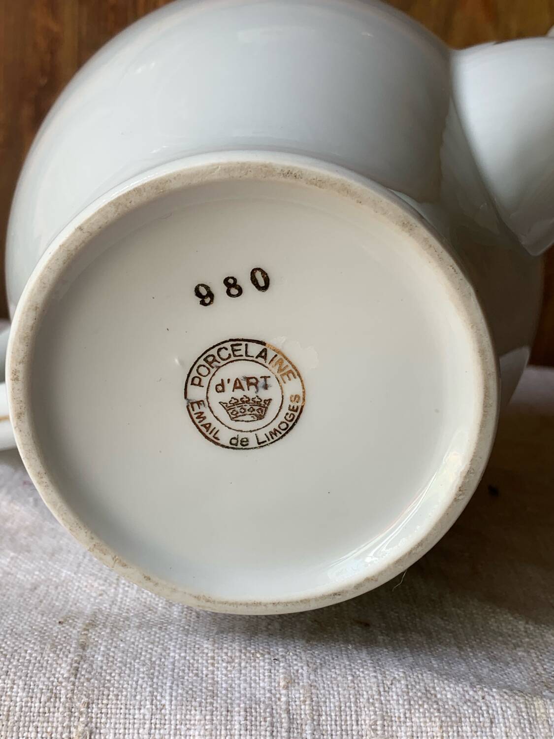 Antique porcelain jug with Limoges enamel