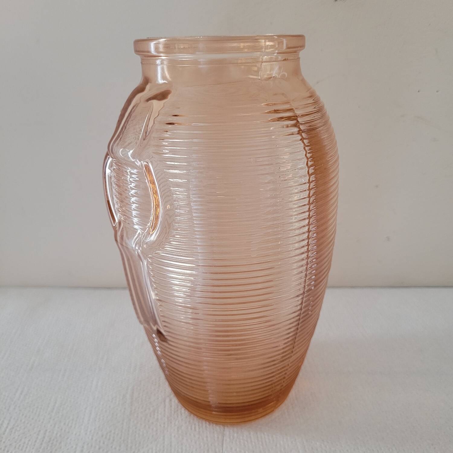 Salmon-colored Art Deco pressed glass vase