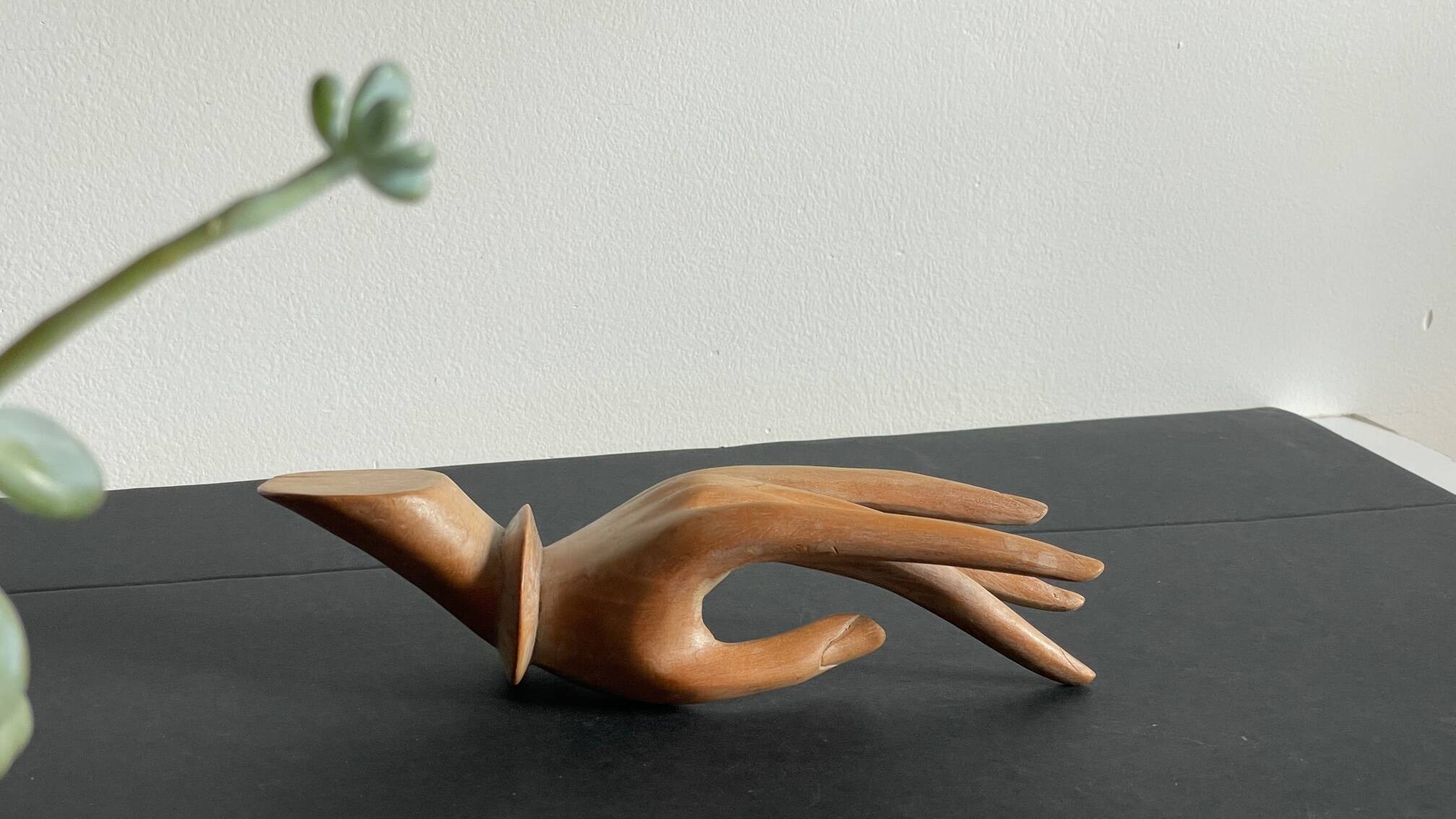 Wooden hand sculpture