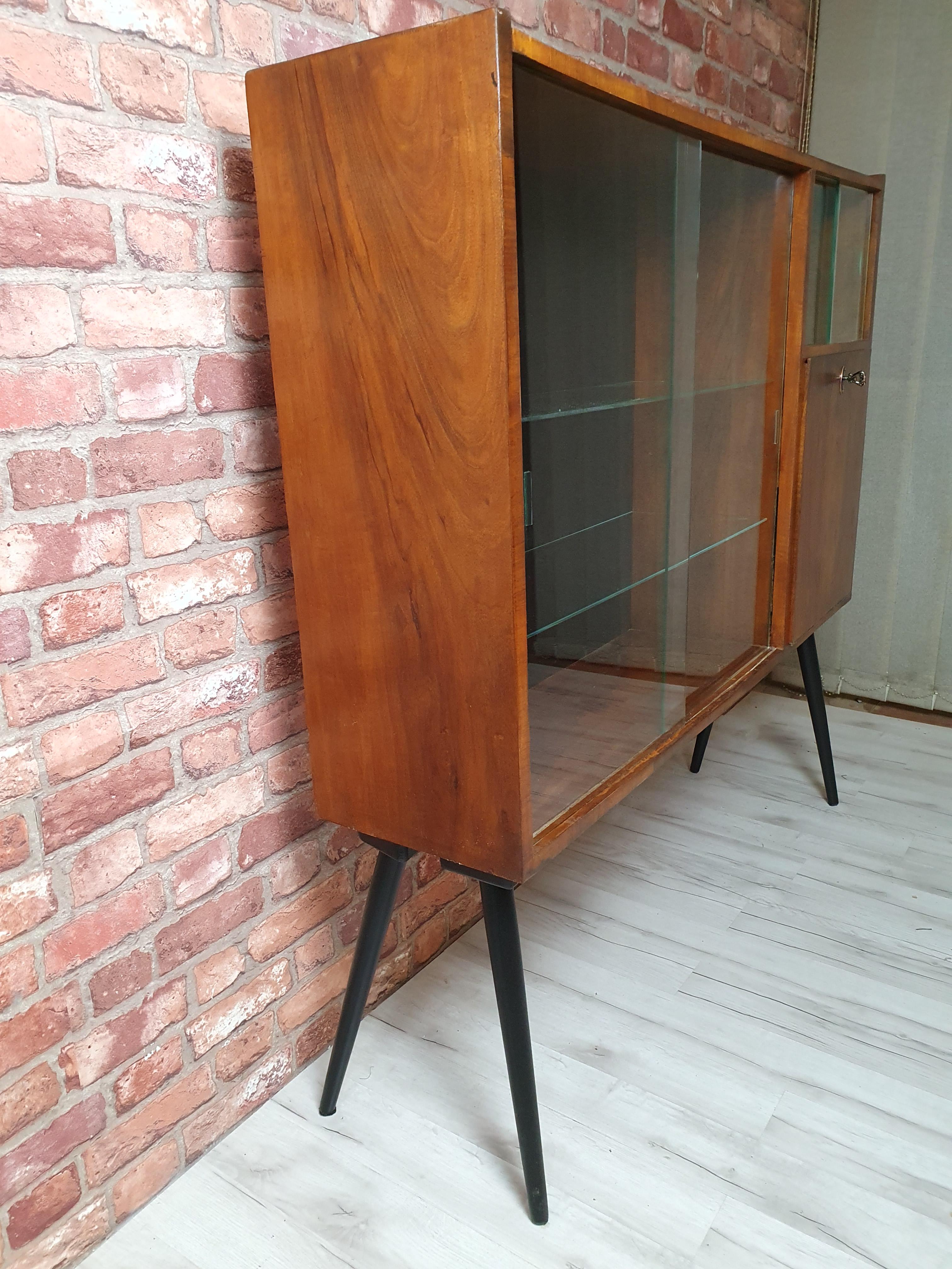 PRL display case on high legs after renovation