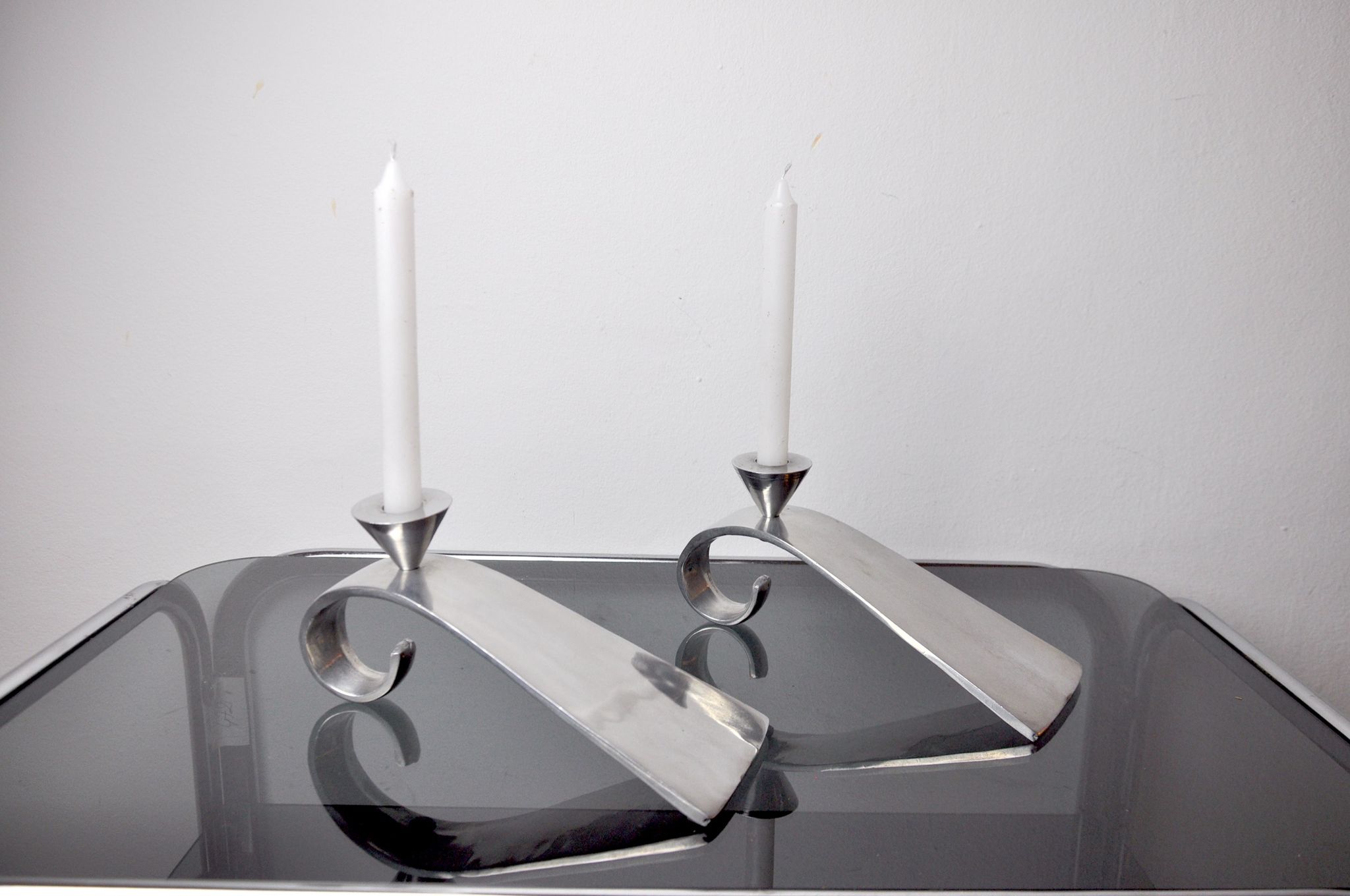 Pair of comma candlesticks by matthew hilton, England, 1980