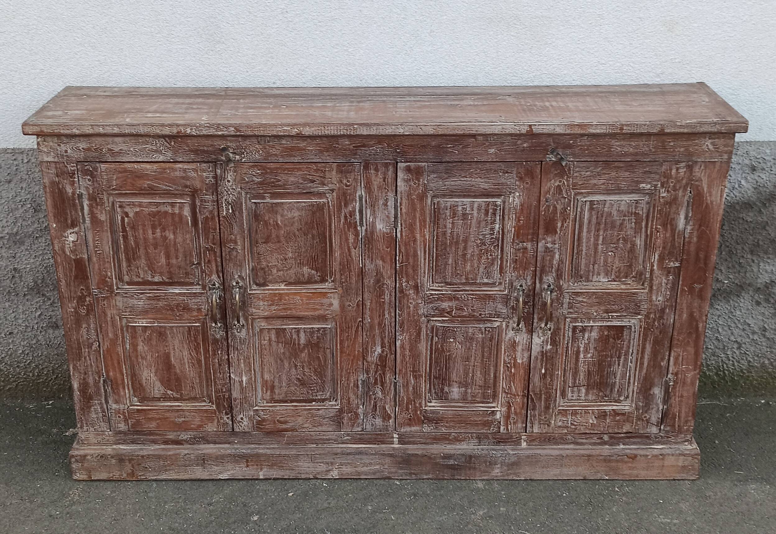 Old wooden sideboard with 4 doors