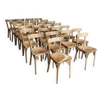 Set of 26 Baumann wooden bistro chairs from the 1950s France