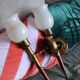 Pair of vintage Lunel house wood and brass wall lights