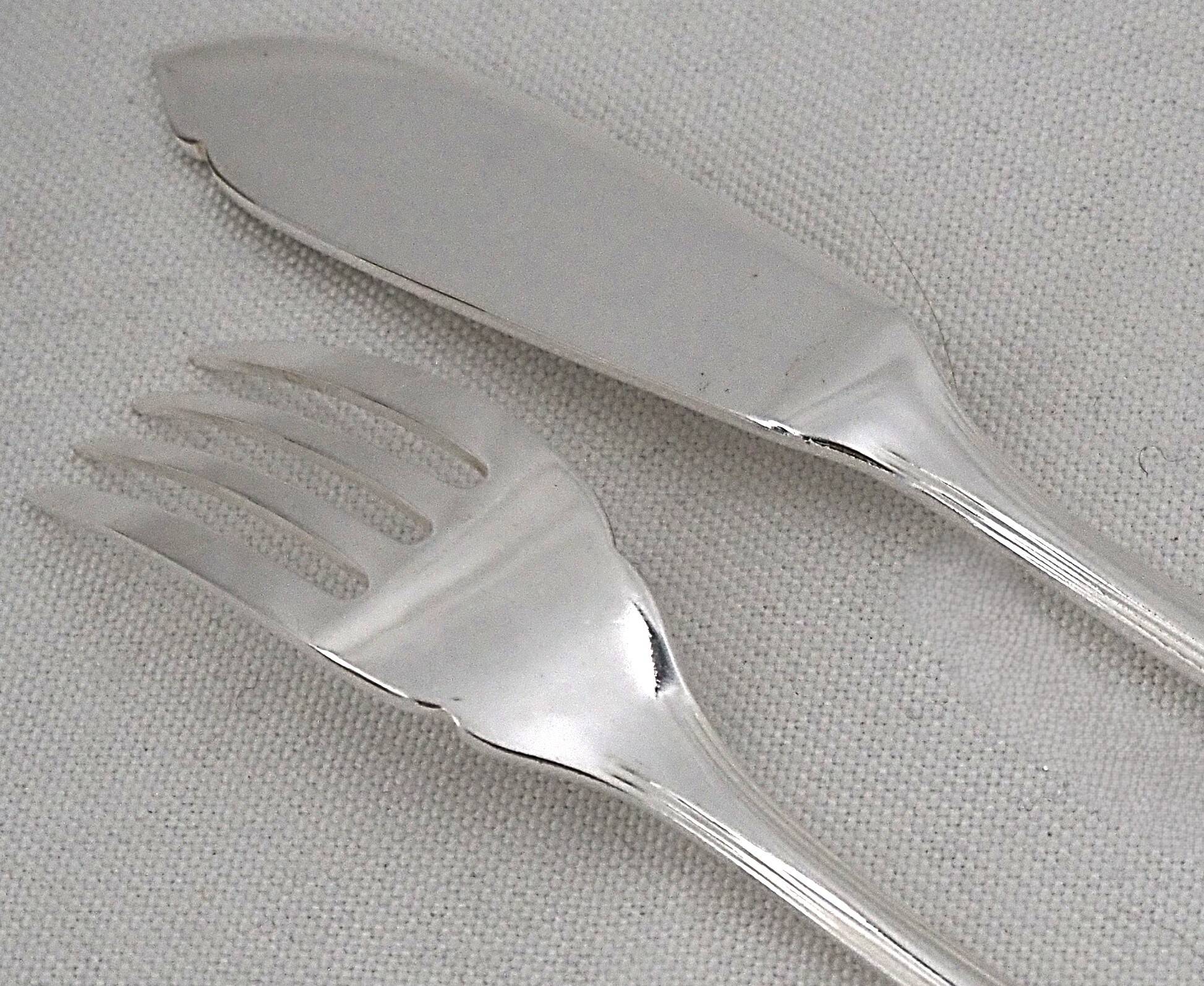 Christofle America, Art Deco 12 fish cutlery, 24 pieces silver-plated metal.