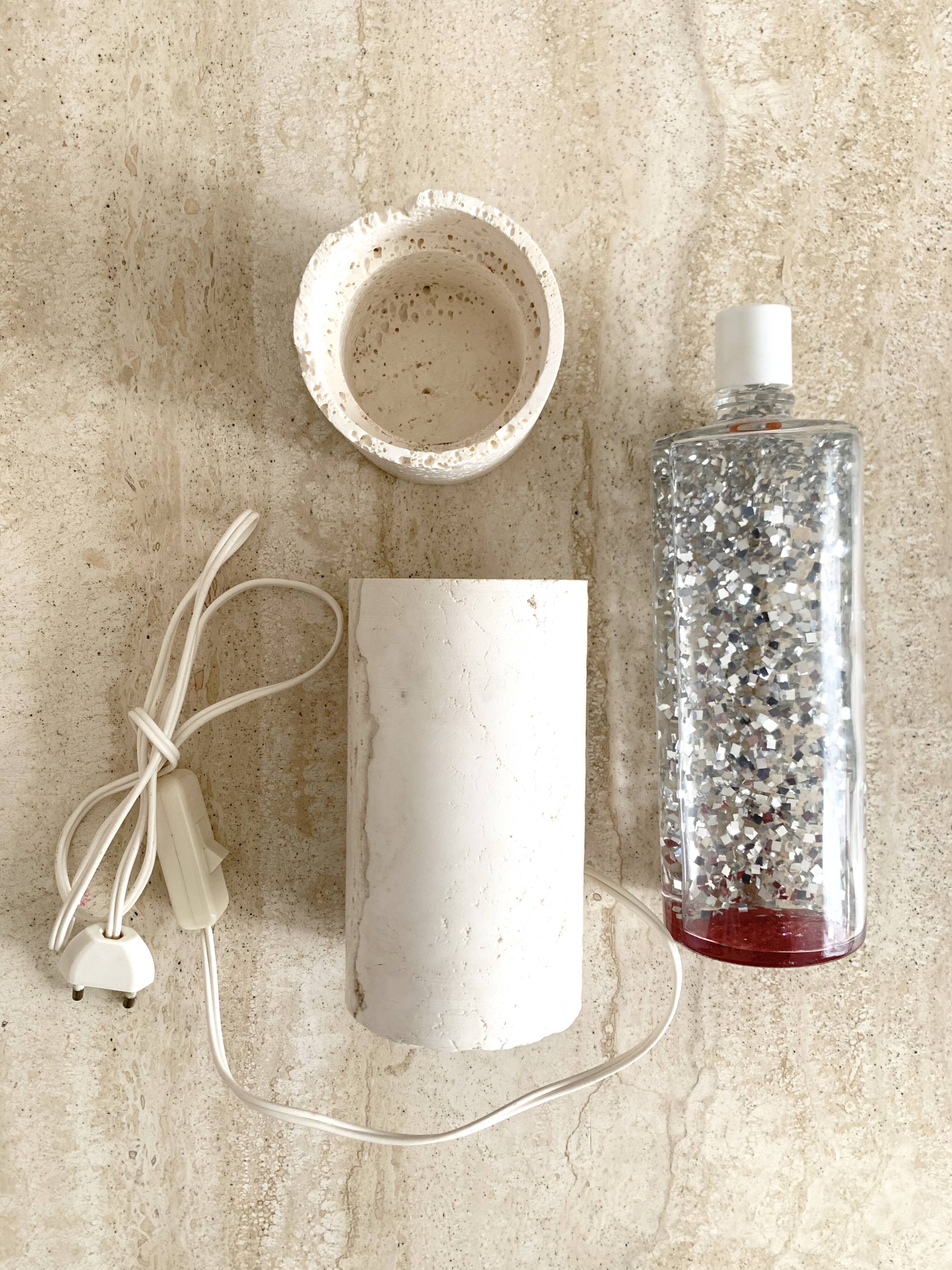Vintage glitter lamp and travertine from the 70s.