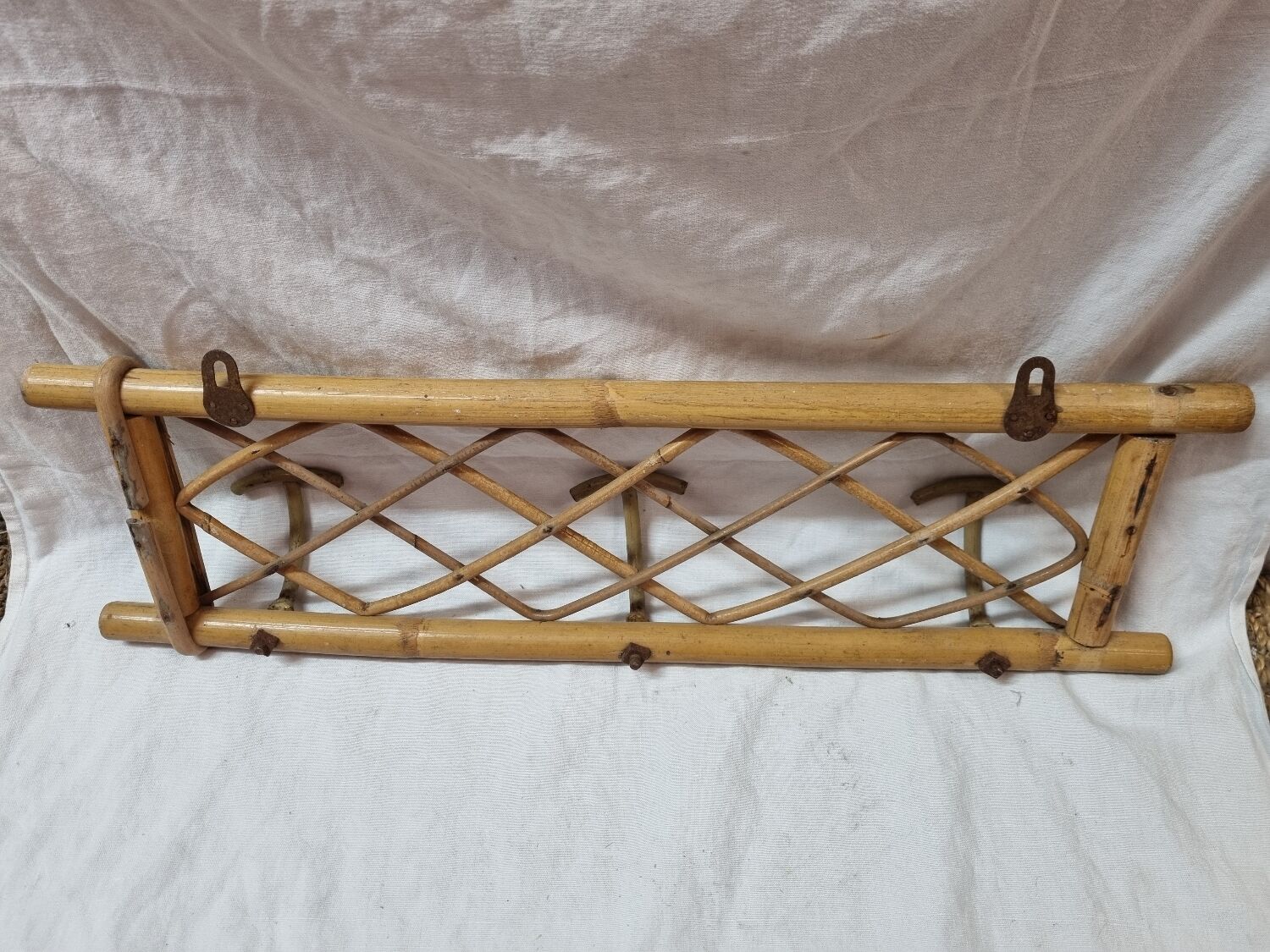Wall rattan coat rack from 1960