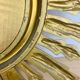 Miroir soleil doré italien années 60 résine