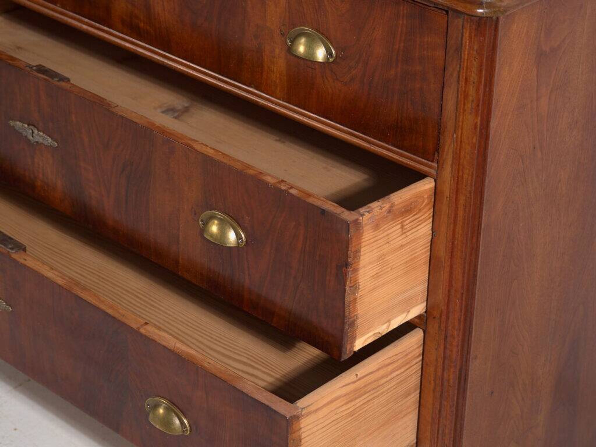 Antique pine chest of drawers with four drawers and brass handles – Central Europe, circa 1900
