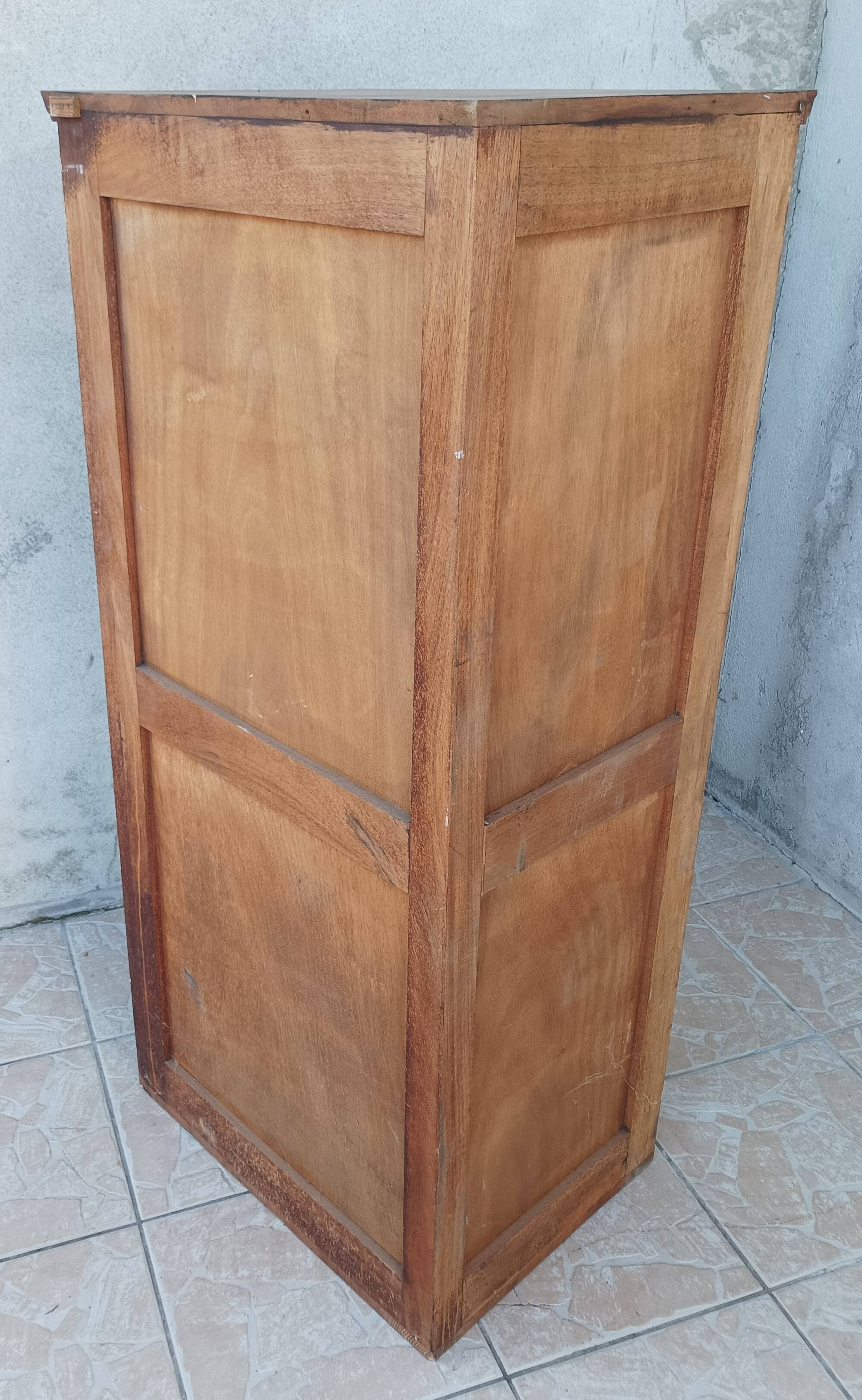 Corner cabinet in carved walnut, Savoyard style.