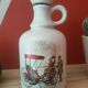 Porcelain carafe with antique decorations