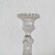Antique baluster-shaped molded glass candlestick holder