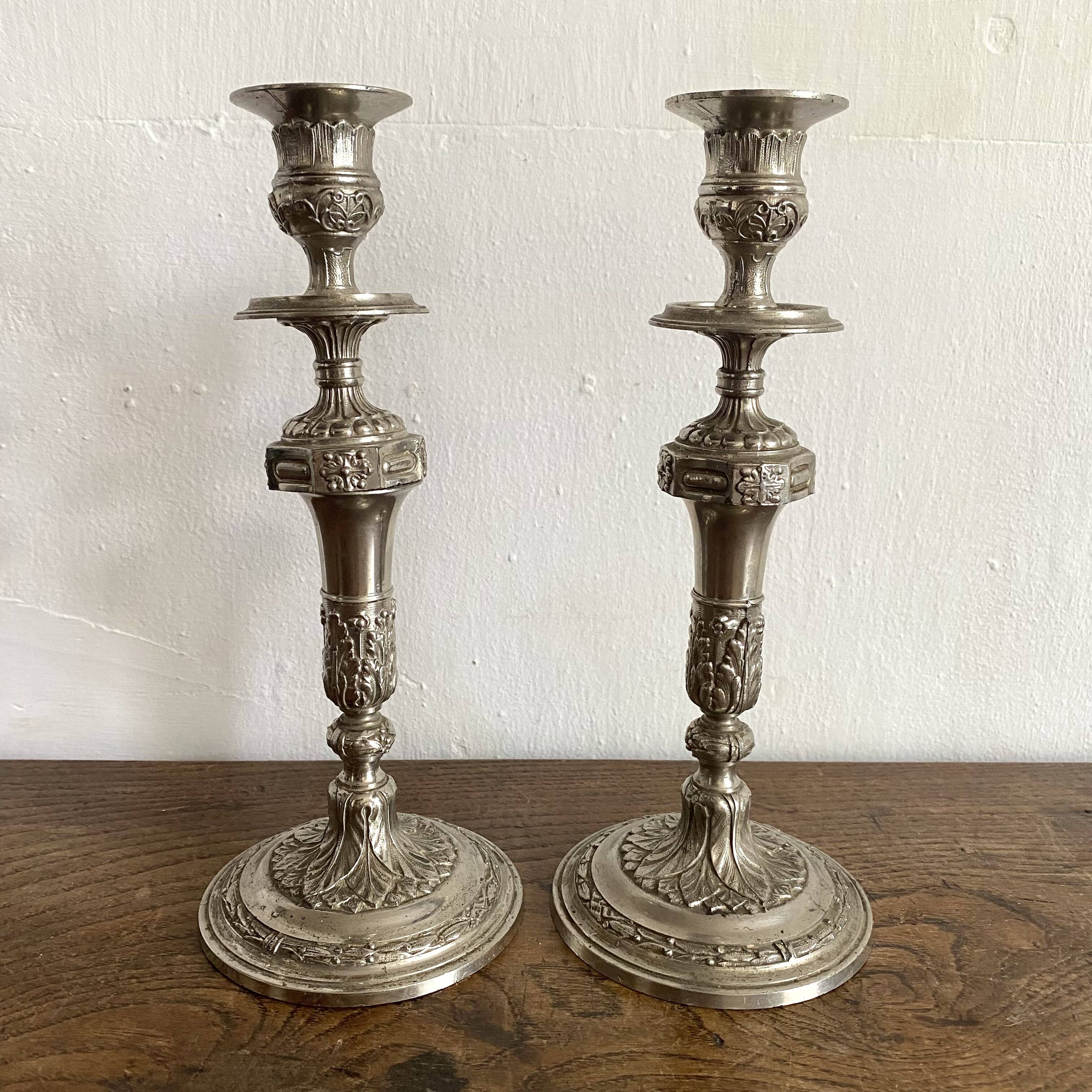 Pair of old silver-plated candlesticks