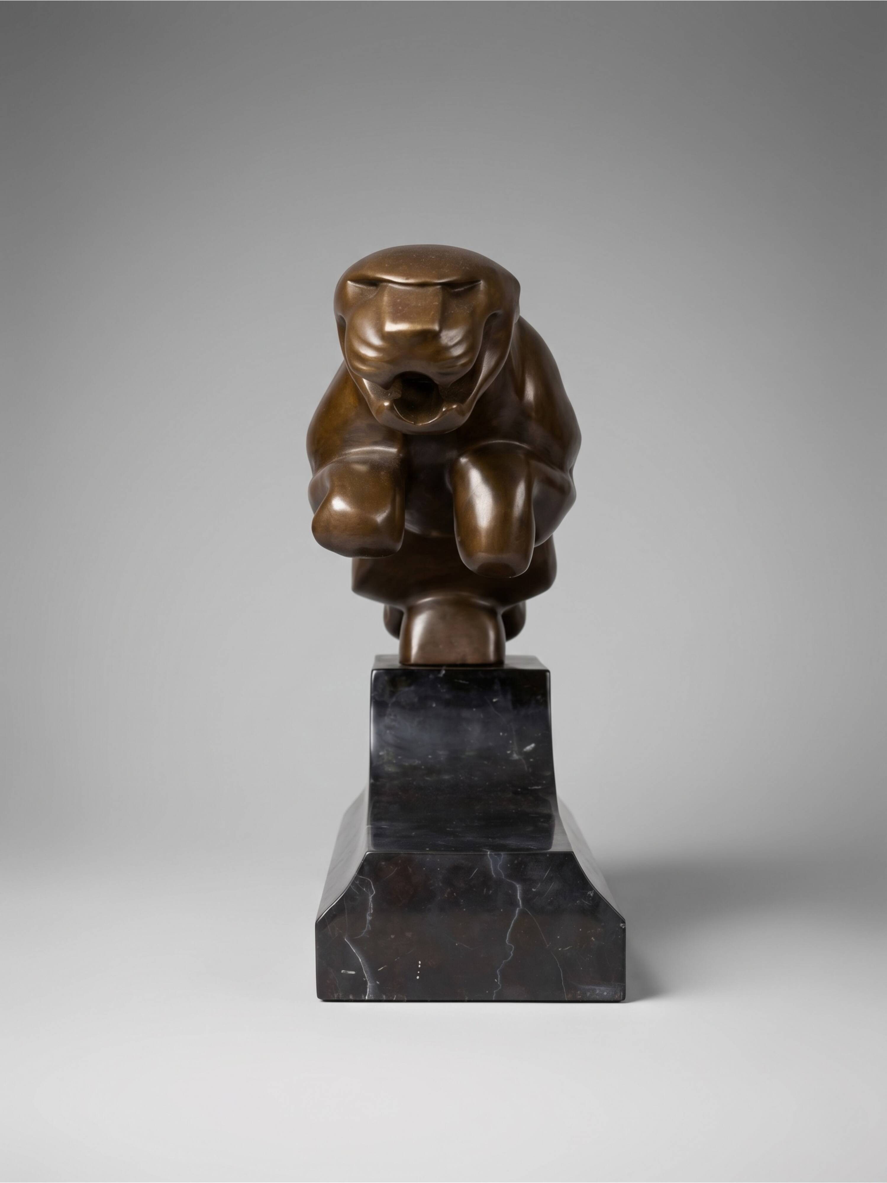Large Art Deco bronze patinated Jaguar sculpture on an architectural base.