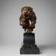Large Art Deco bronze patinated Jaguar sculpture on an architectural base.