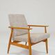 Fauteuil scandinave en tissu tressé beige