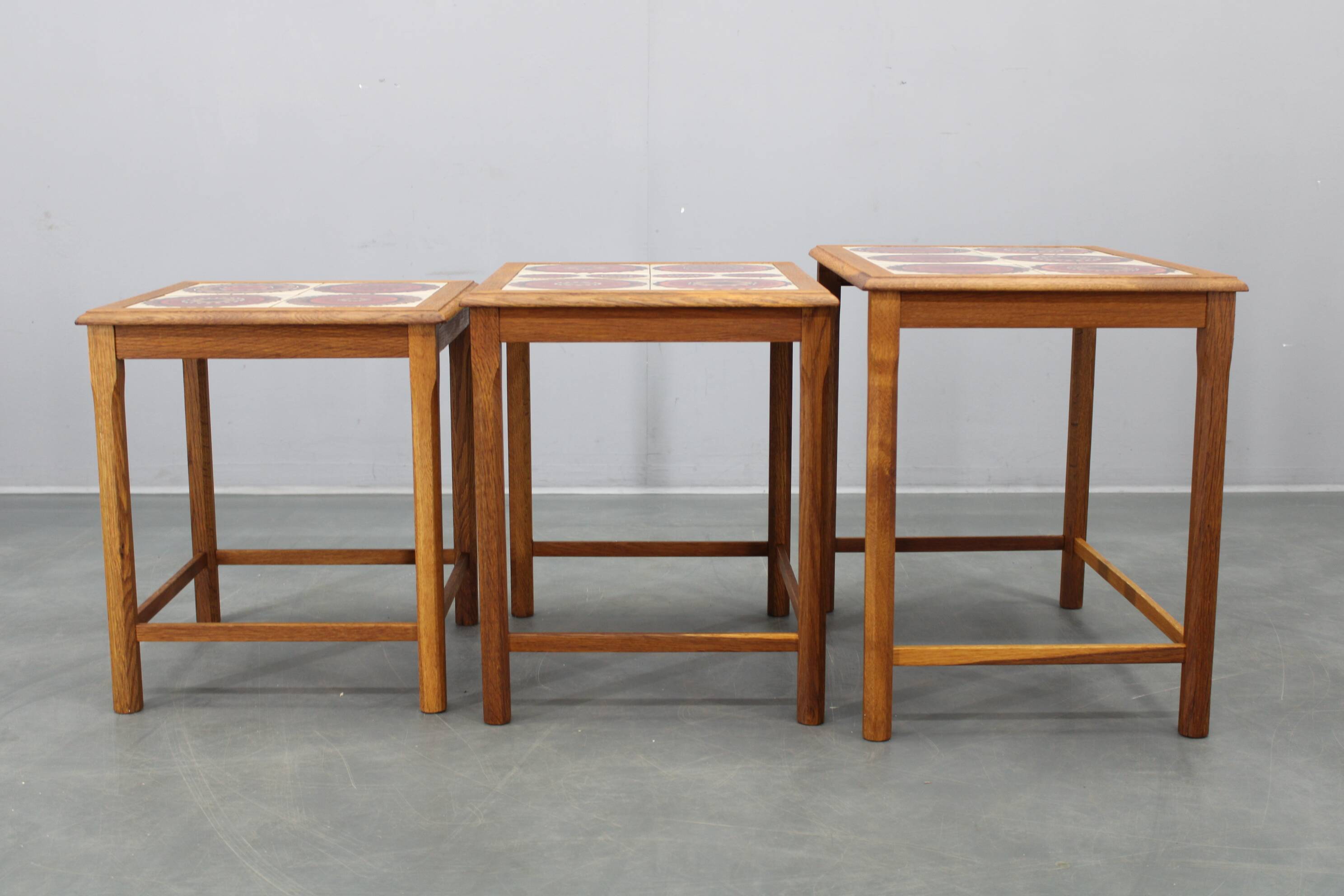 Mid-century Danish oak nesting tables with tile tops