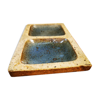 Cup in ancient sandstone land of his and turquoise