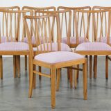 Set of 8 vintage Danish design dining chairs from the 1970s with light purple fabric seats