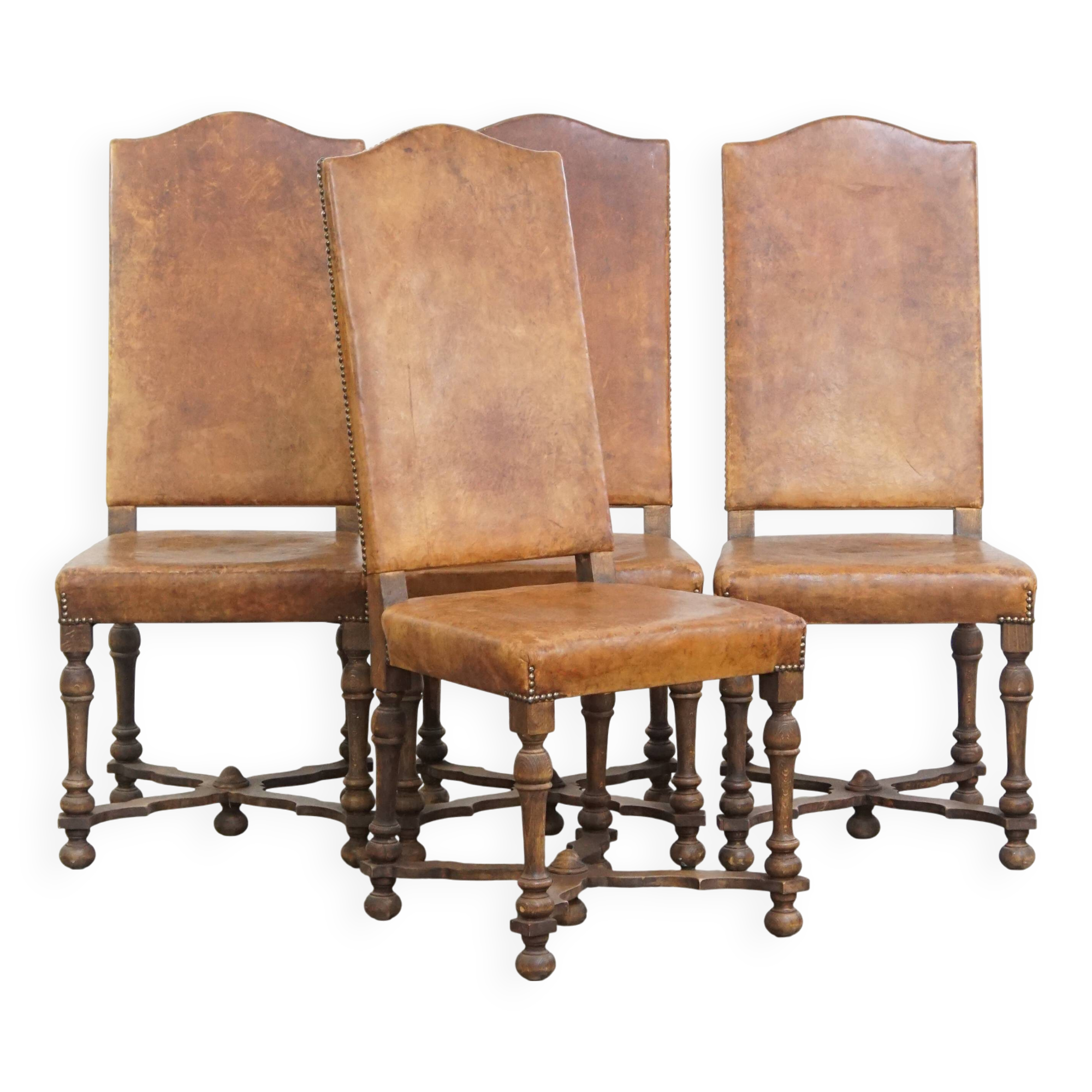 Set of 4 antique wooden and sheepskin leather dining chairs