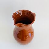 Vintage pitcher in glazed earth