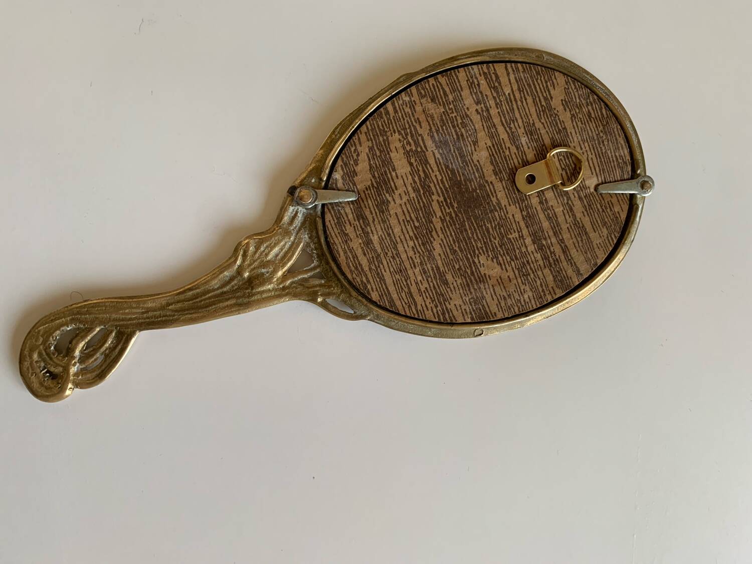 Art Nouveau brass mirror for women