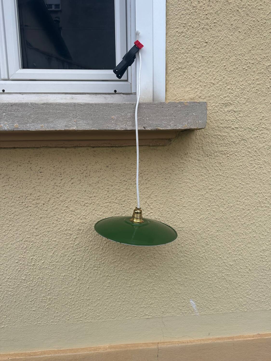 Vintage pendant light with green and white enamelled sheet metal lampshade and LED electricity