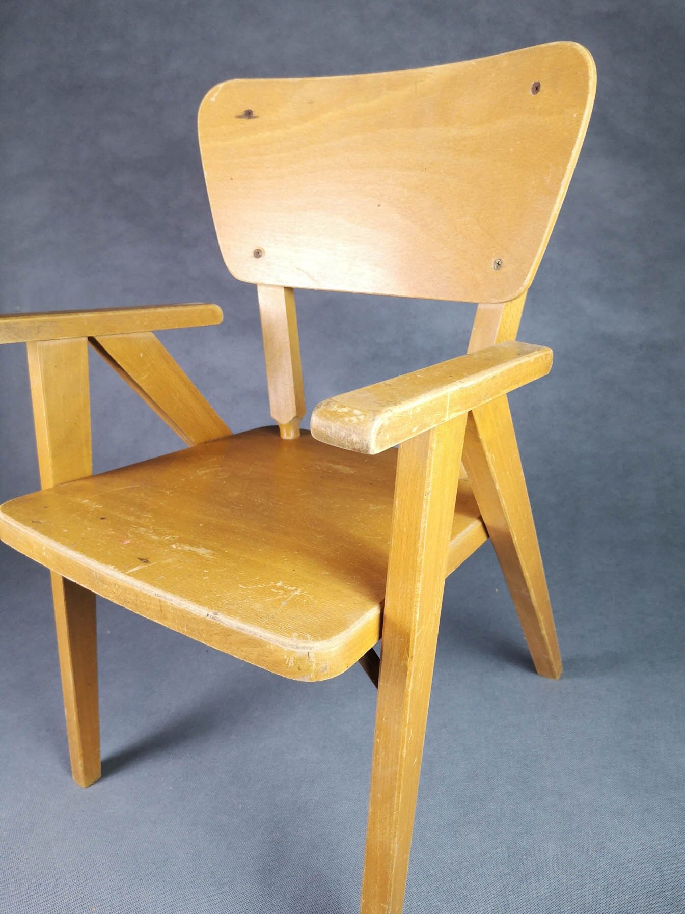 Vintage armchair child feet compass light wood