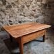 18th-century cherry wood coffee table with two drawers.