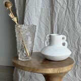 Glass vase with stylized flower pattern