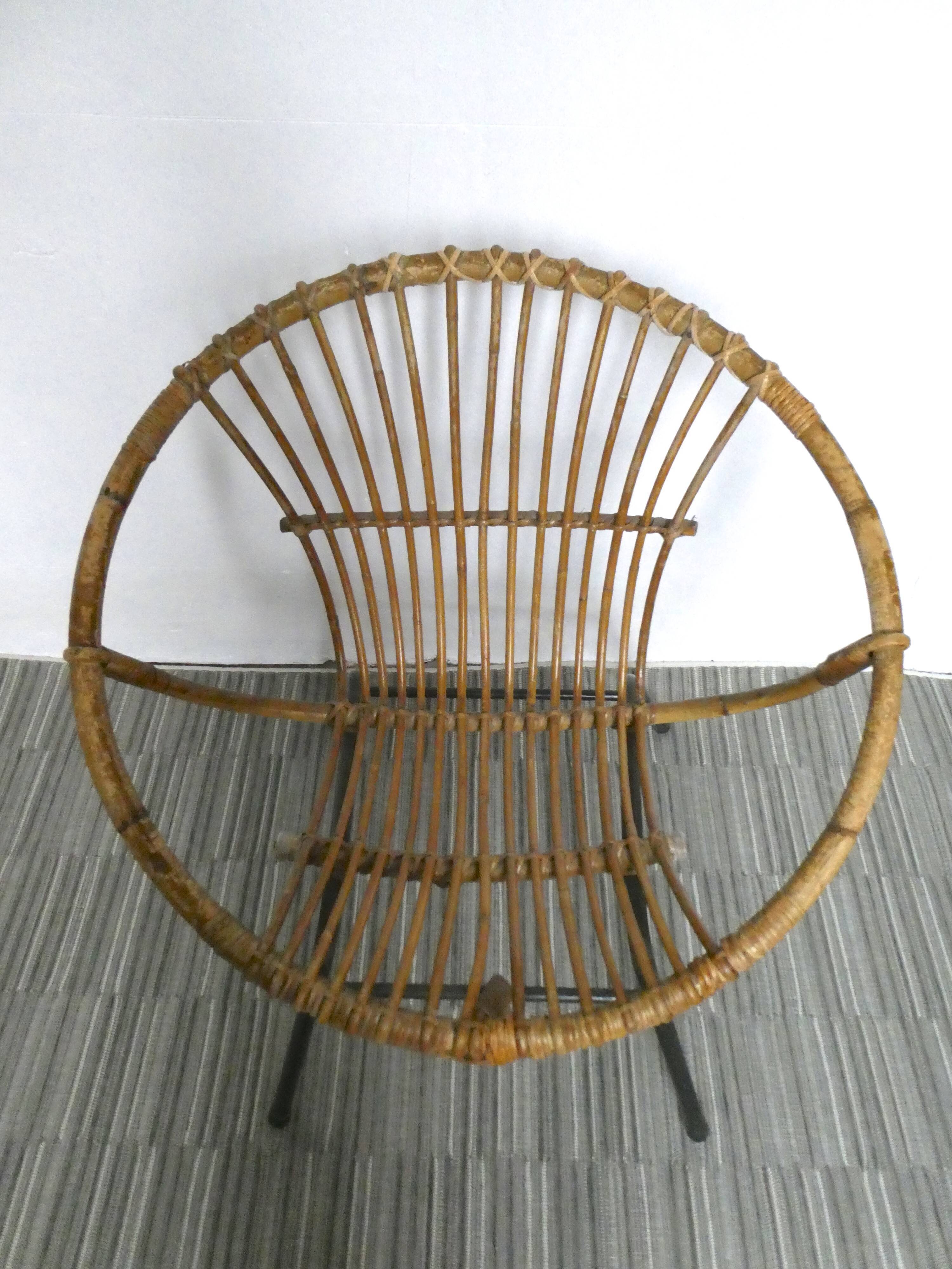 Rattan armchair and 1960s metal feet