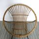Rattan armchair and 1960s metal feet