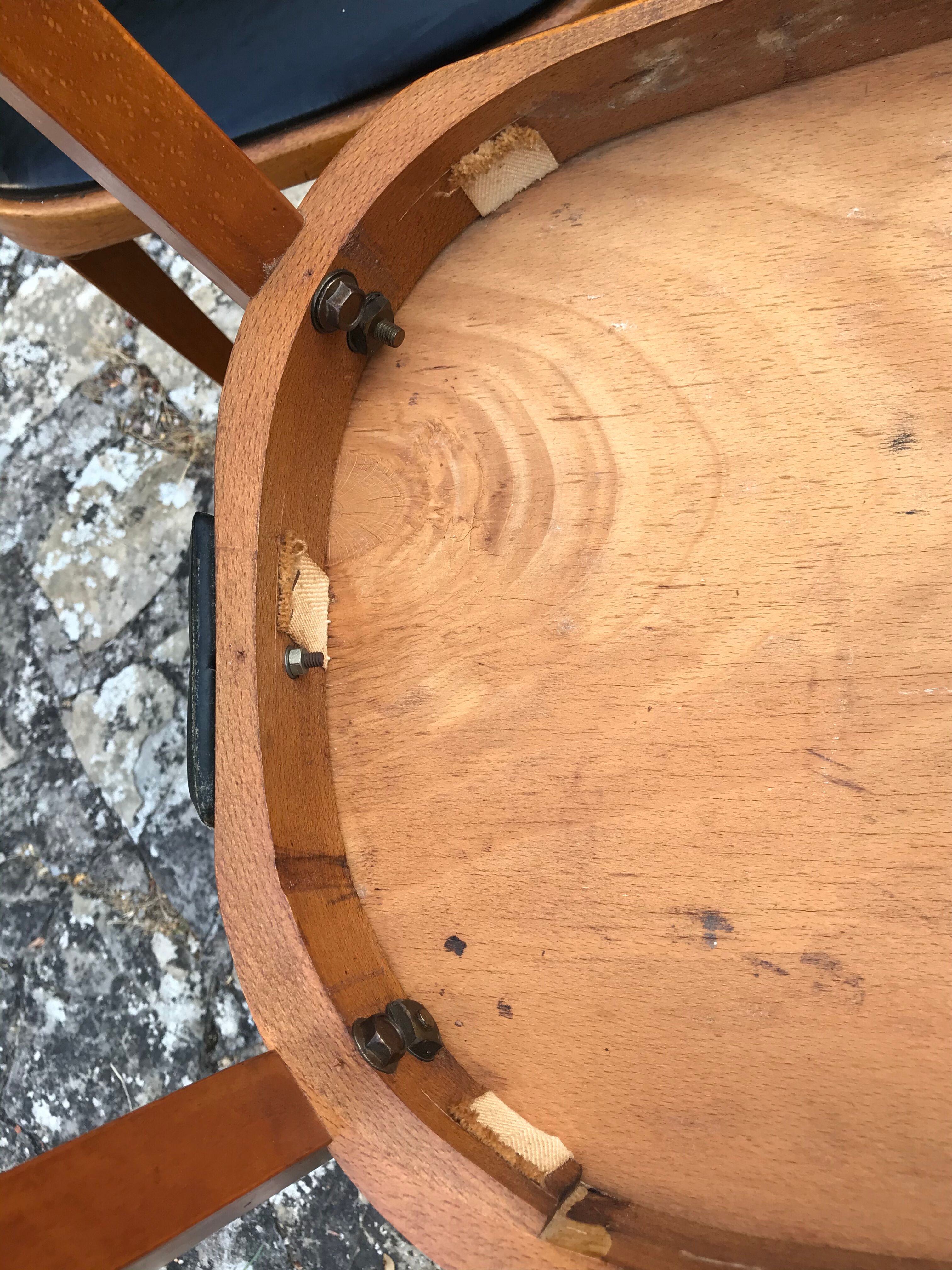 Four vintage beech and skai chairs