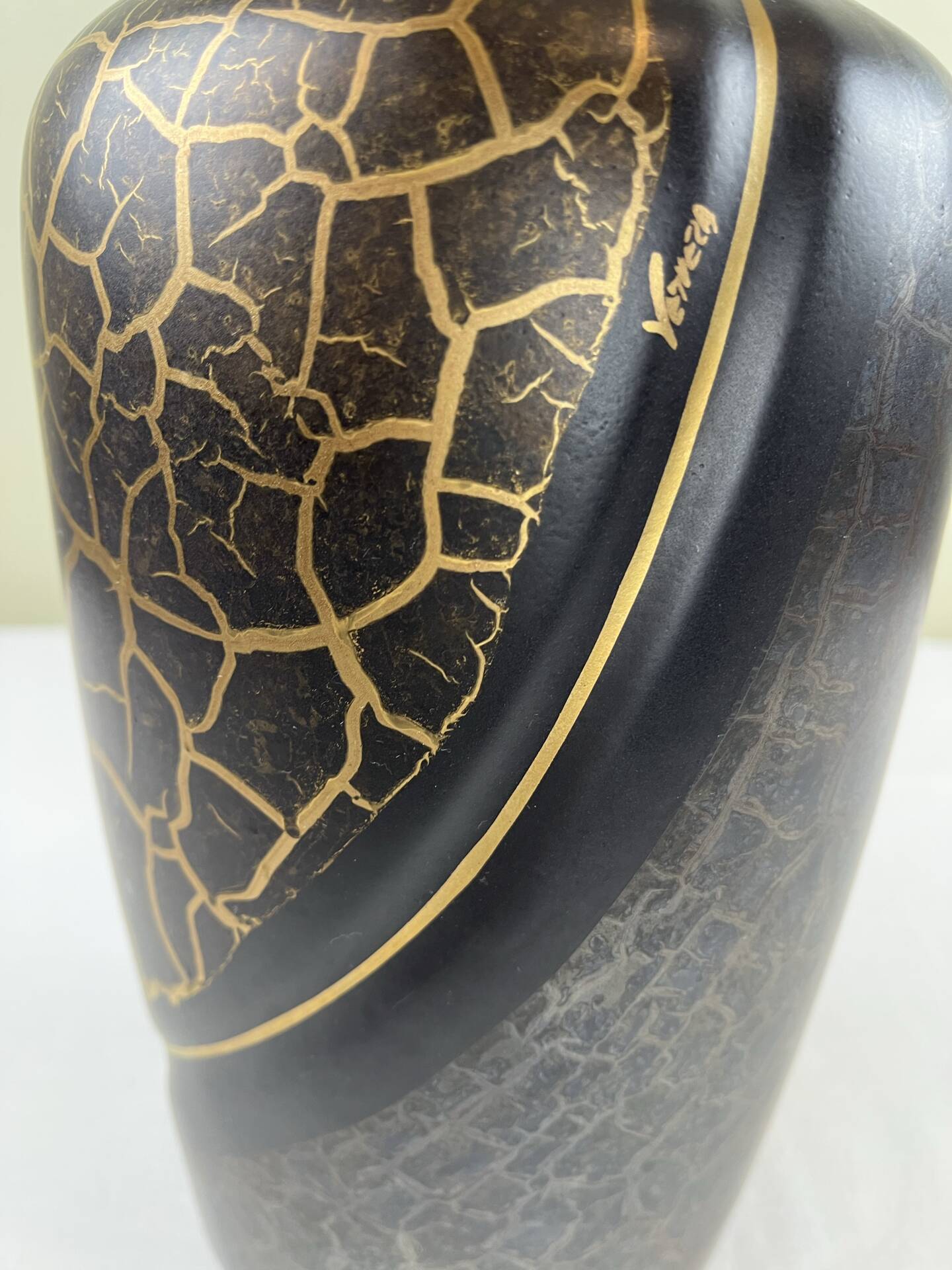 Vase with golden scales