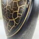Vase with golden scales